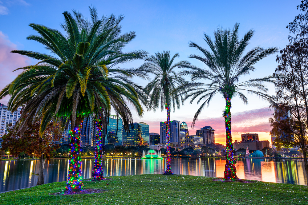 Orlando, Florida, USA downtown skyline at Eola Lake.-1